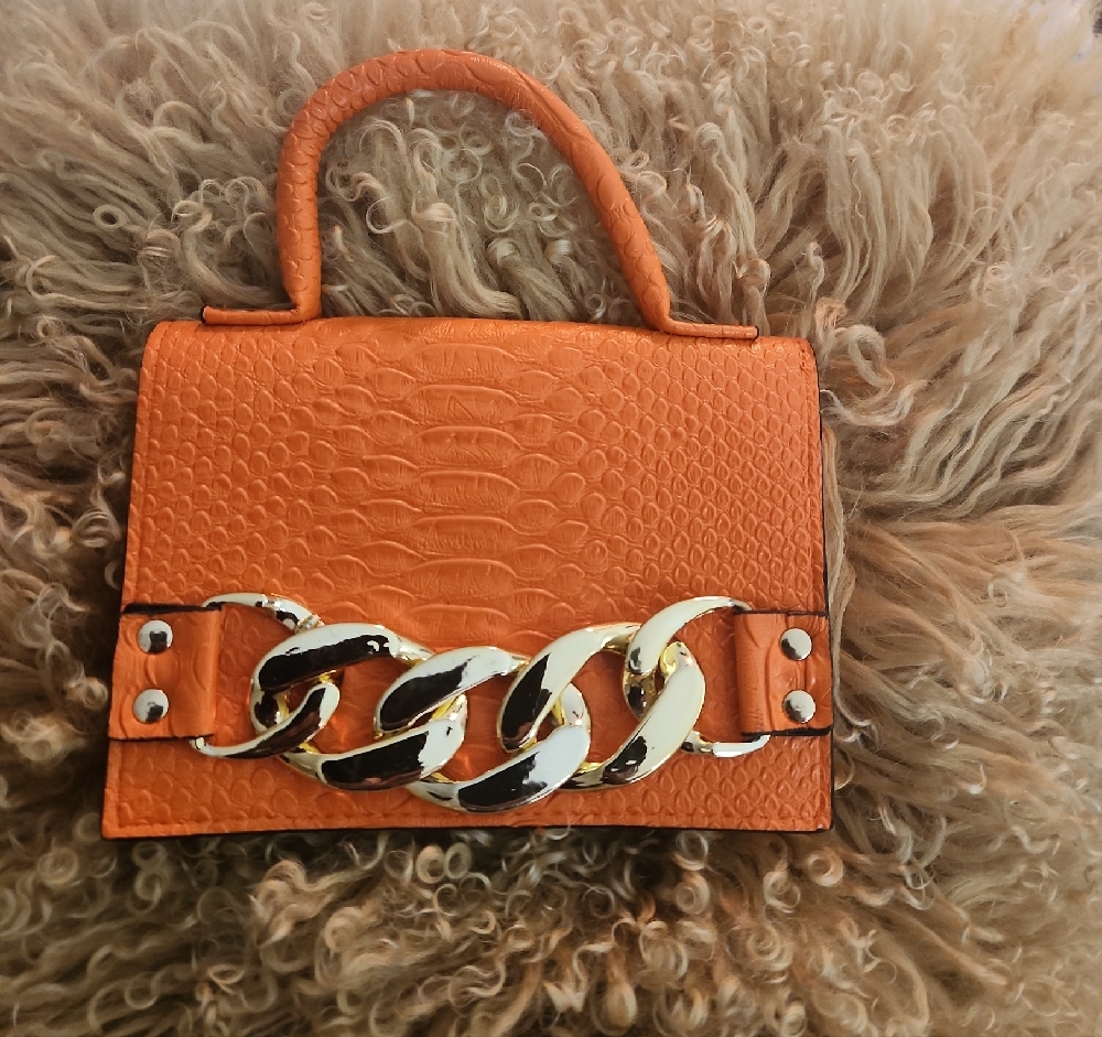 Edgy Orange Mini Bag with Chain Detail